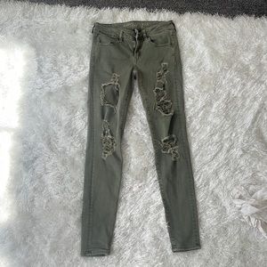 Green stretchy American Eagle ripped jeans